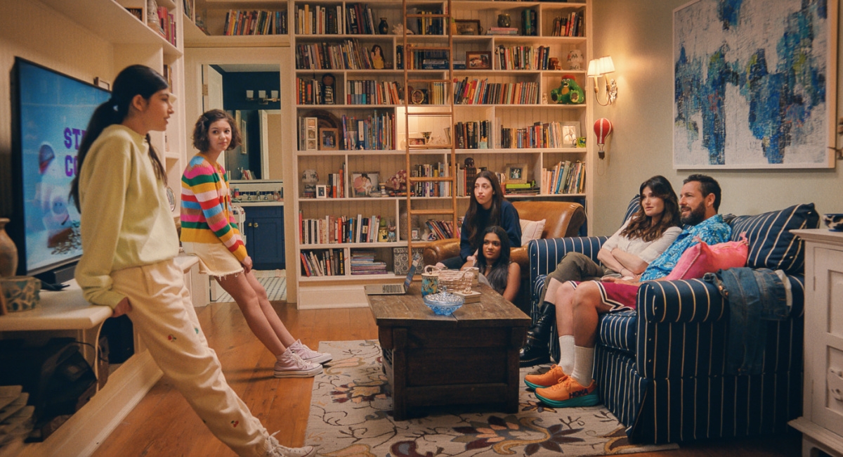 Sunny Sandler as Stacy Friedman, Samantha Lorraine as Lydia Rodriguez Katz, Sadie Sandler as Ronnie Friedman, Zaara Kuttemperoor as Zaara, Idina Menzel as Bree Friedman and Adam Sandler as Danny Friedman in 'You Are So Not Invited To My Bat Mitzvah.'