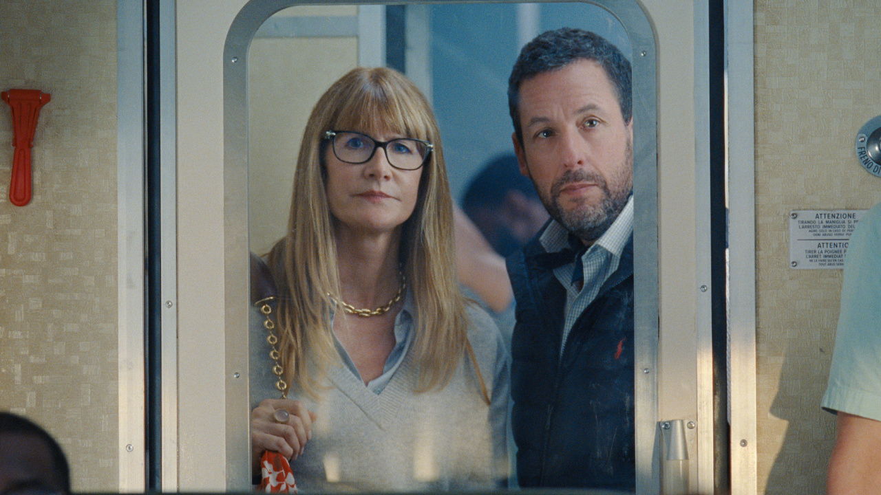 (L to R) Laura Dern as Liz and Adam Sandler as Ron Sukenick in 'Jay Kelly'. Cr. Netflix © 2025.